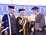 Mr. M.N. Venkatachaliya, Former Chief Justice of India awarding student for his meritorius performance